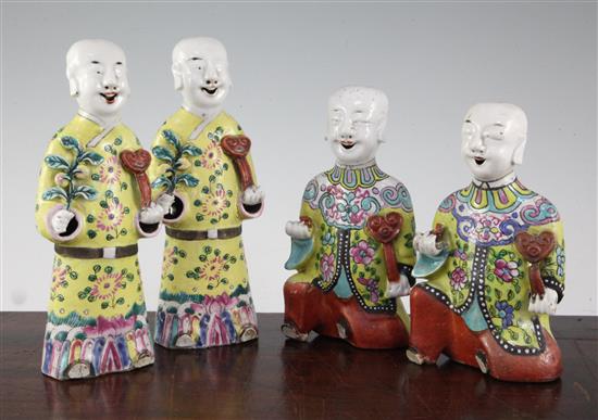 Four Chinese enamelled porcelain figures of the He He Erxian, late 18th / early 19th century, 17cm and 20.5cm